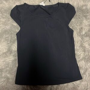 Garage apron back top, size m, never been worn, open back, in style right now